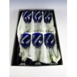 A set of six cobalt blue cut glass wine glasses