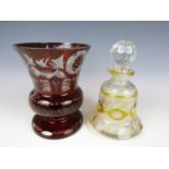 A 19th Century Bohemian ruby flashed and cut glass vase together with a similar decanter