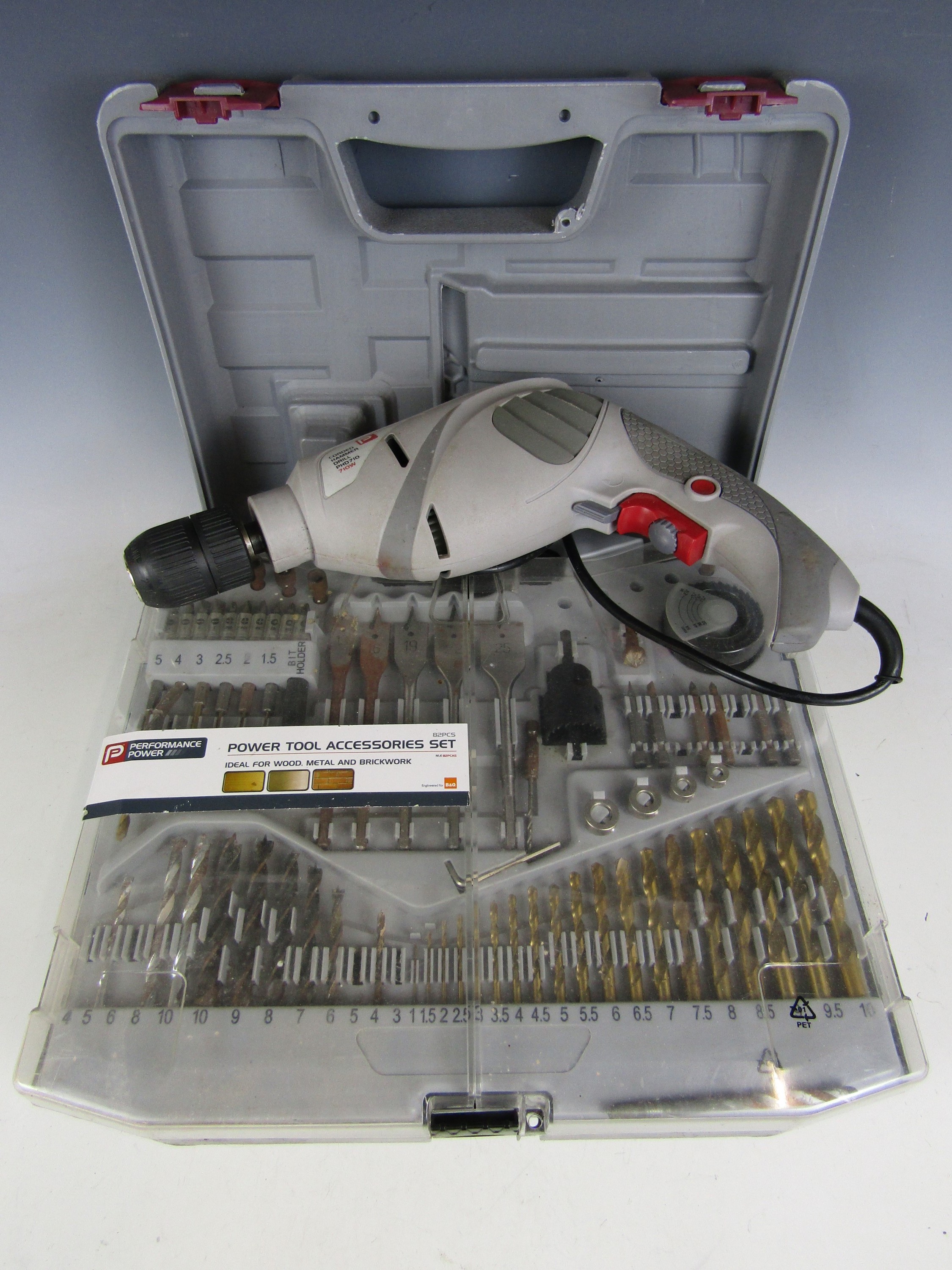 A performance power hammer drill PHD710 together with an accessories set