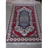 A Modhumita wool rug, 182 x 274 cm