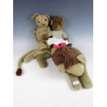 A 1940s Teddy bear, together with a plush doll and lion