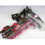 Two pairs of crampons together with two Camp Hielo ice pick axes