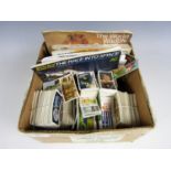 A large collection of tea and cigarette cards, including a number of completed and partially