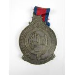 An 1814 Royal Bristol Volunteers medal, obverse the arms of the city of Bristol within an annulus