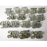 A quantity of late 19th / early 20th Century Police white metal shoulder titles