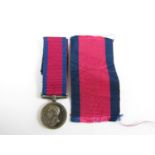 A miniature Waterloo Medal together with a full size ribbon