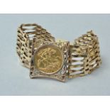 A 1929 gold sovereign held in a 9ct gold plaque on a fancy 9ct gold gate link bracelet, 25.3g total