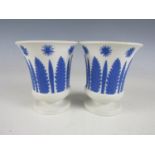 A pair of 19th Century Wedgwood spill vases, each of campana from and bearing sprigged fern and star