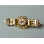 A late Victorian 9ct gold, diamond and pearl Etruscan Revival bar brooch, with canetille and