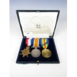 A 1914-15 Star, British War and Victory medal group to Lieut J M McEwan, RNVR, mounted in Gieves