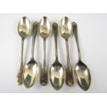 A set of six George V silver teaspoons with golf terminals, Sheffield, 1932, 79.1g