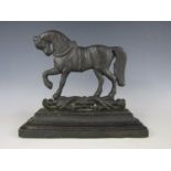 A 19th Century cast iron door stop modelled as a horse, 27 cm