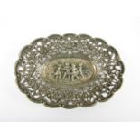 A 19th Century continental white metal trinket dish, having repousse moulded decoration to the