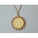 An 1891 gold sovereign, in a yellow metal pendant mount, on a 9ct gold curb link neck chain, 12.9g