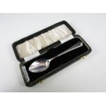 A cased silver spoon, engraved with the latter H to the terminal, Birmingham, 1958, 21.5g