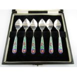 A cased set of six George VI silver coffee spoons by Bernard Instone, each having subtly planished