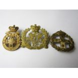 A Victorian Manawatu Mounted Rifles cap badge and two others