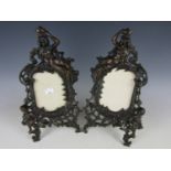 A pair of Art Nouveau bronzed iron picture frames manufactured by Beatrice, shape number 1007A and