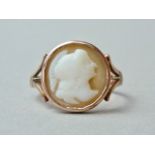 An early George V 9ct gold and possibly earlier shell cameo ring, carved in depiction of Pallas