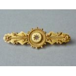 A Victorian diamond and high-carat yellow metal Etruscan Revival bar brooch, the rose cut diamond