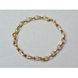 A 9ct gold faceted belcher link bracelet, 8.6g