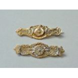 Two Victorian 9ct gold Etruscan Revival bar brooches, one with a locket back, 3.2g total