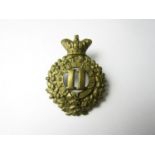 An 11th (North Devon) Regiment of Foot glengarry badge