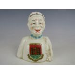 An early 20th Century Arcadian China Suffragist crested ware two-faced figurine, one side in