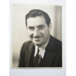 [Autograph / Disney] Walter Elias 'Walt' Disney (1901-1966) Signed studio photograph of a young Walt