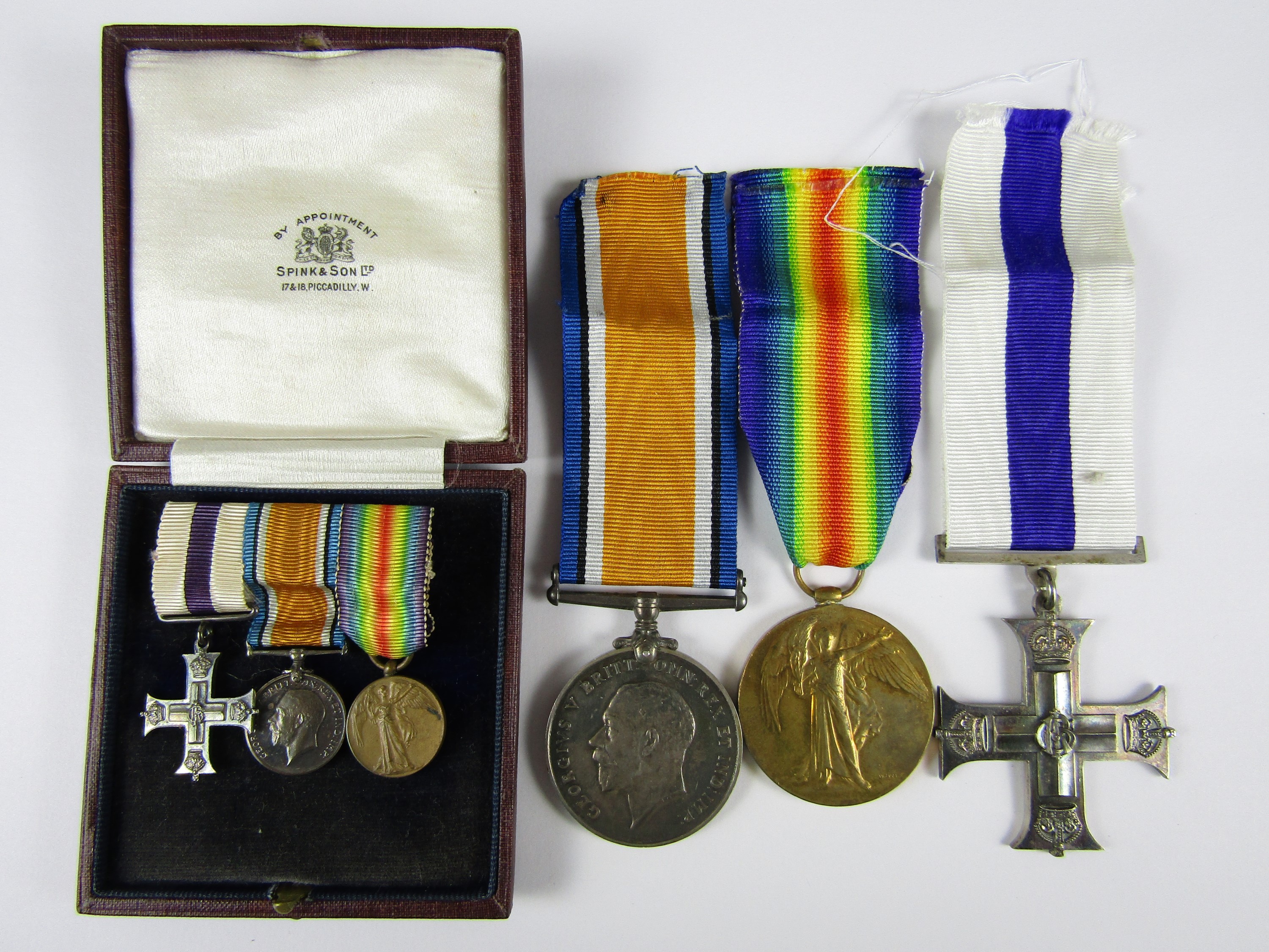 A First World War gallantry medal group comprising Military Cross, British War and Victory medals,