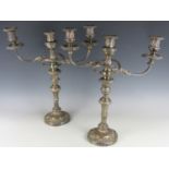 A pair of late 19th Century electroplate two branch three light candelabra, 46 cm high
