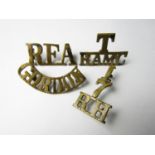 Four various territorial and other brass shoulder titles including T-7-RH