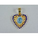 A high carat yellow-metal and aquamarine openwork pendant in the form of a heart, centrally claw-set