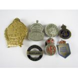 Seven various military lapel badges including a Second World War Evacuation Hostel Scotland