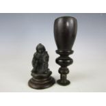 A 19th Century desk seal with turned ebony handle and chequered matrix, together with a small