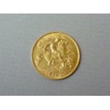 A 1910 gold half sovereign