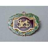 A 1927 Hudson & Scott enamelled 9ct gold long service fob, with later brooch pin back, 10.5 g