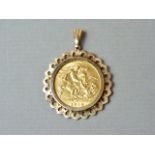 A 1914 gold half sovereign, in a 9ct gold pendant mount, 6.1g