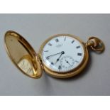 A 19th Century Waltham rolled-gold hunter pocket watch, with crown wound lever movement, white