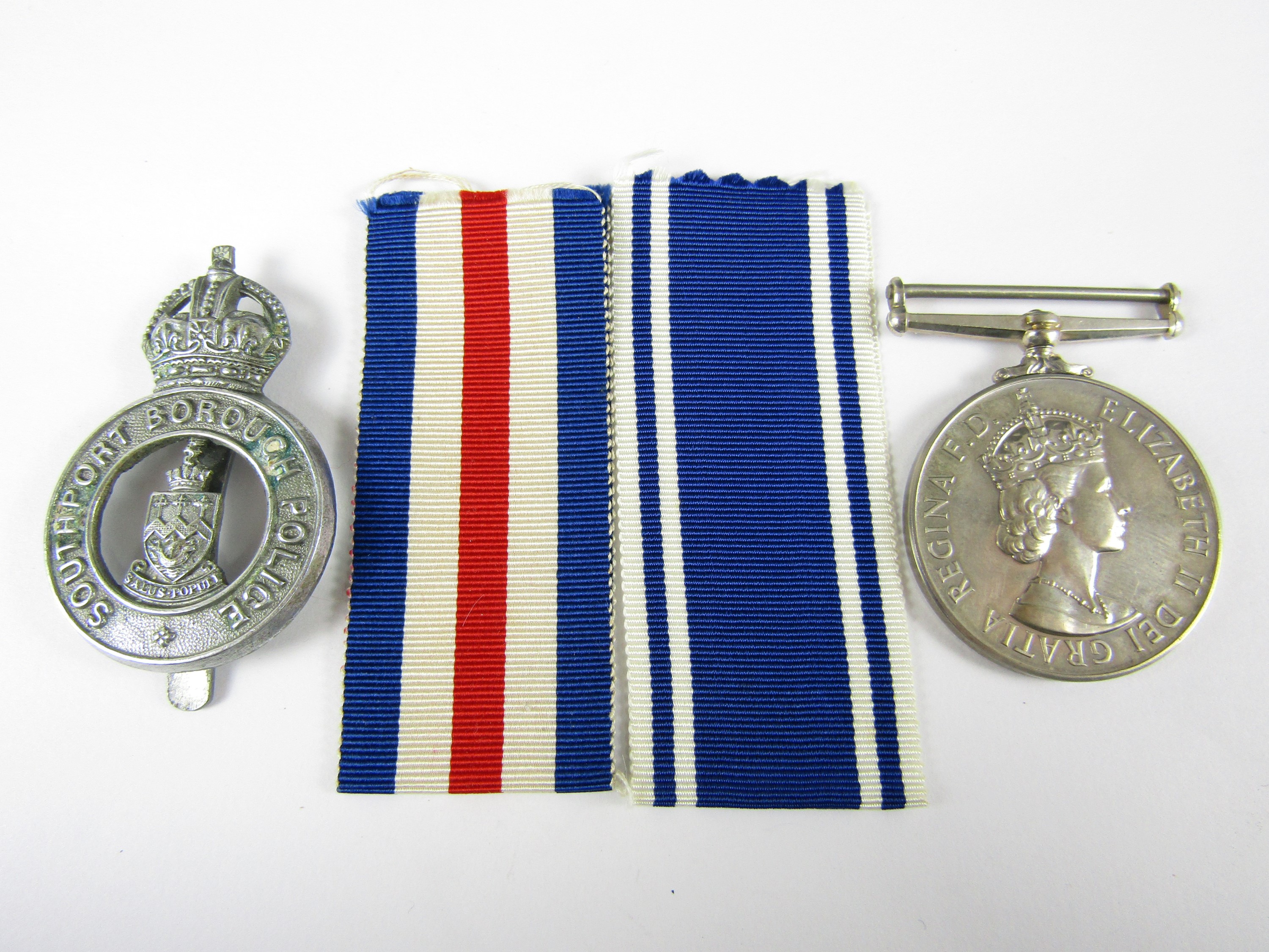 A Queen Elizabeth II Police Long Service and Good Conduct medal to Constable Wilfrid C Arnold,