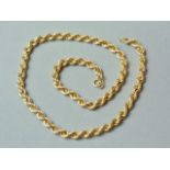 A 9ct gold rope-link neck chain, 46 cm, 12.2g