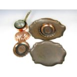 Copperware including two trays, two small pans and sundry moulds etc.