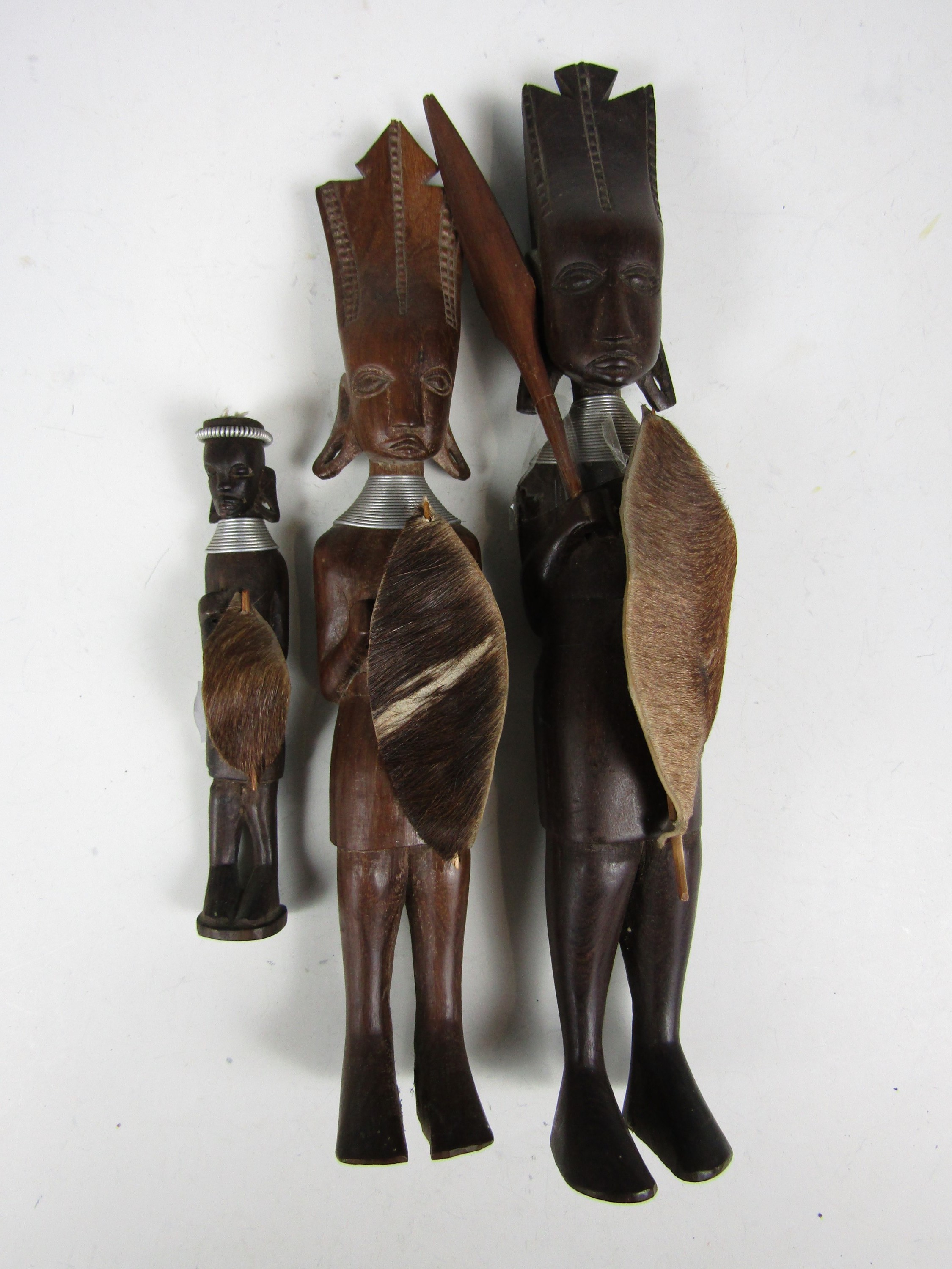 Three Tanzanian carved wooden figures