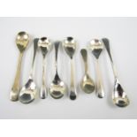 A selection of eight early 20th century silver salt cruet spoons including Old English pattern