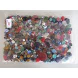 A large quantity of multi-coloured vintage glass and composition cabochons