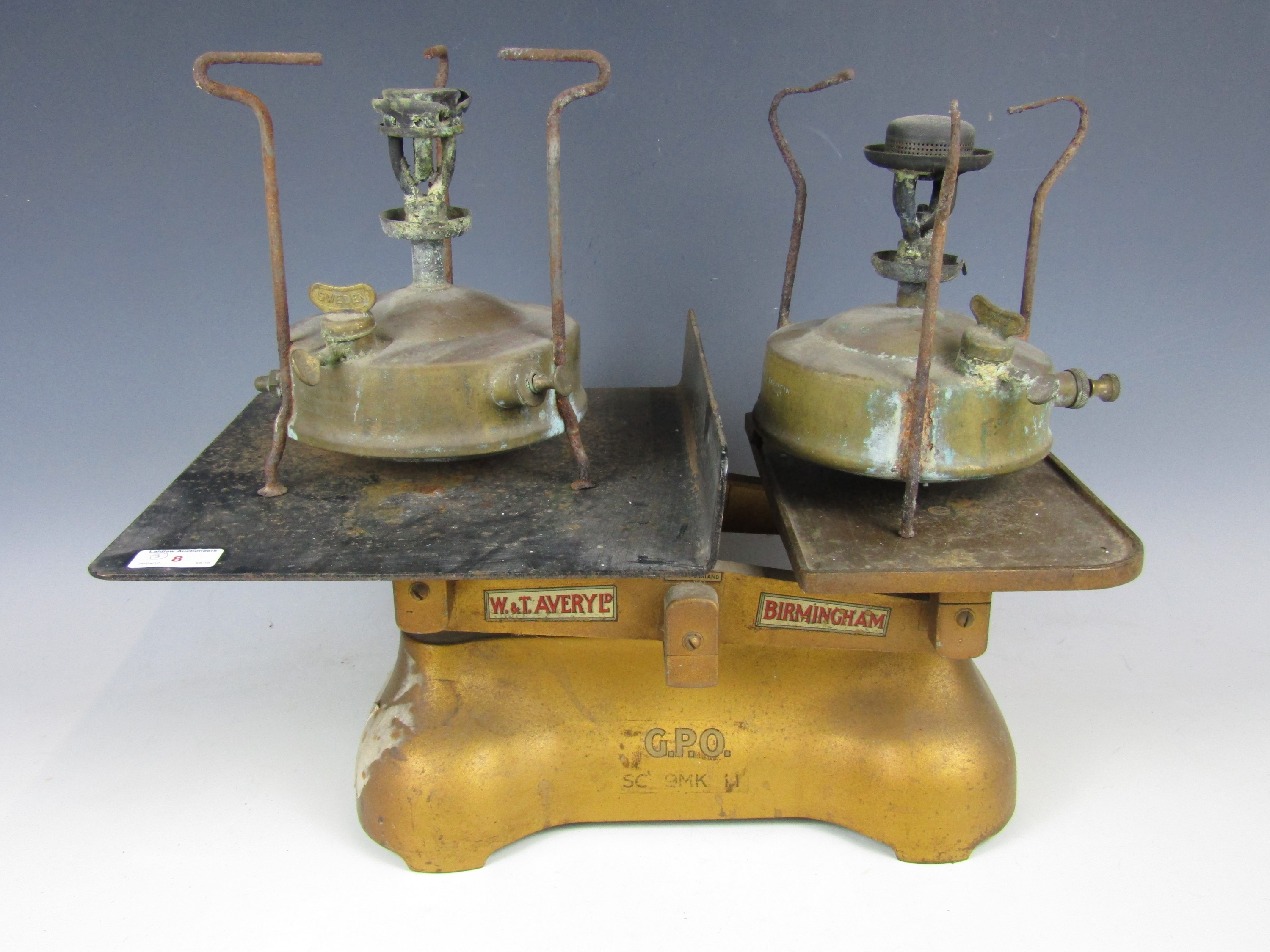 A vintage set of Avery GPO scales together with two stoves