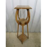 An oak plant stand, 108 cm high