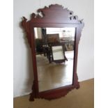 A contemporary mahogany Georgian style fretwork mirror