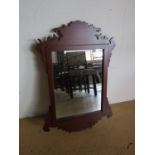 A contemporary mahogany Georgian style fretwork mirror