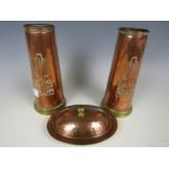 A pair of copper vases together with a planished copper butter dish